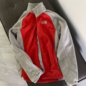 North face womens XS used khumbu fleece- red and grey color